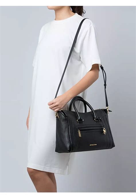 carine large pebbled leather satchel.